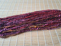 Strawberry Liquorice - tones of bright orange, pink and purple interlaced with black