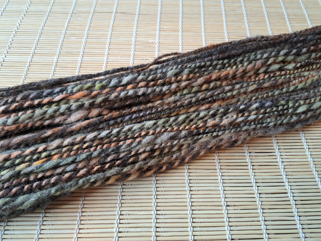 Deep Earth - tones of rich brown, green, burnt orange and charcoal