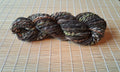 Deep Earth - tones of rich brown, green, burnt orange and charcoal