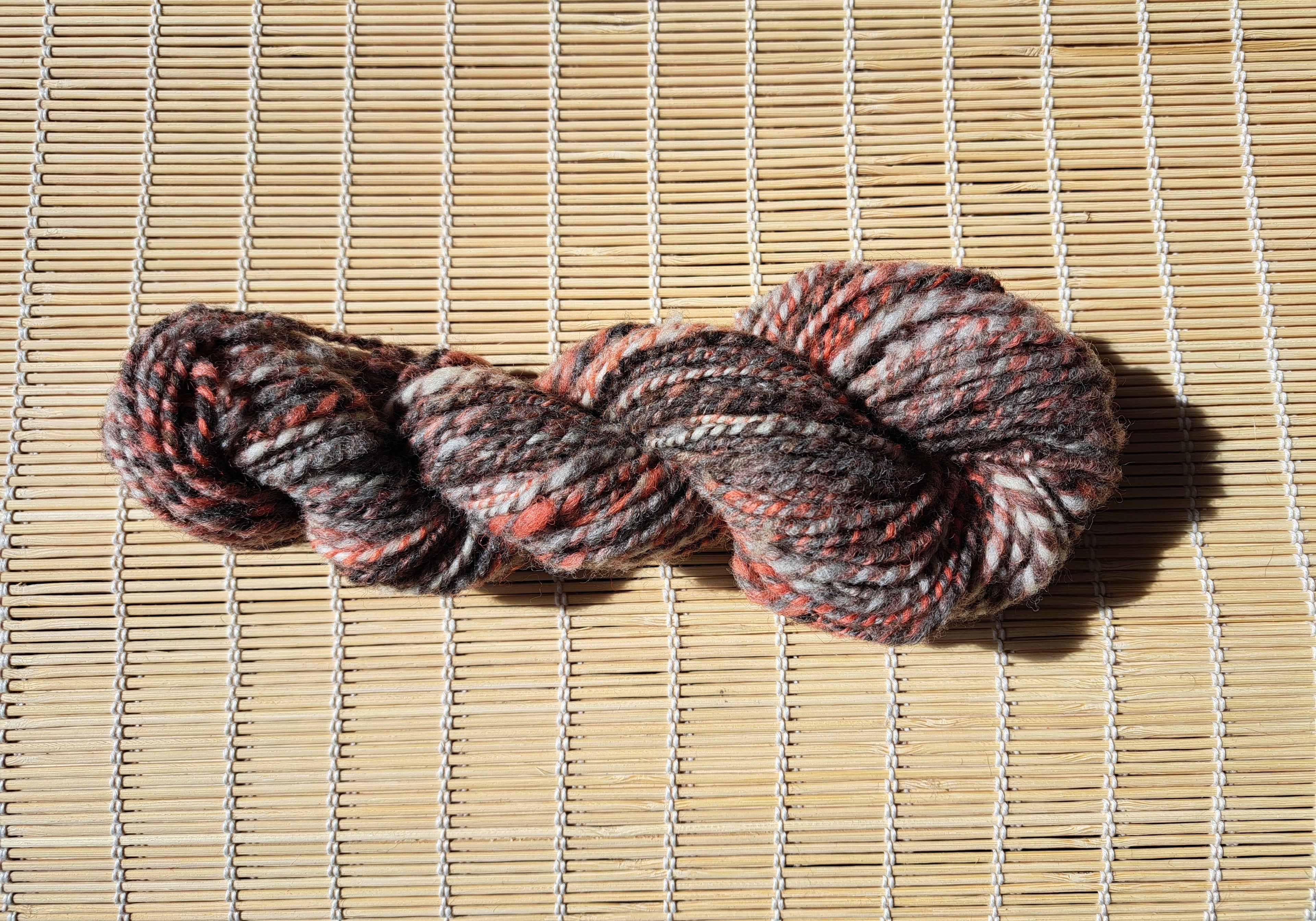 Sandstone - tones of dark brown, charcoal, Burnt orange and white